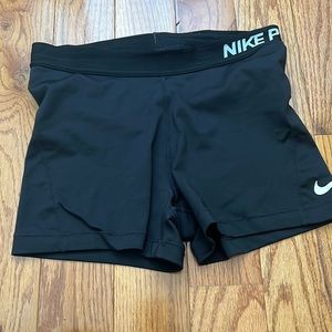 Black Nike 3 inch pros. Good condition no distress or tears size m